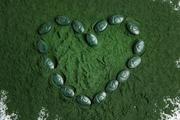 Spirulina is a useful supplement. on a white background
