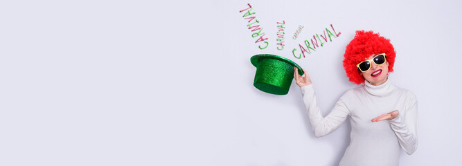 funny woman in wig, glasses and hat isolated, carnival party concept