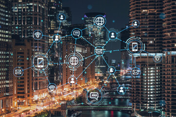 Illuminated aerial city panorama of Chicago Riverwalk downtown, Boardwalk with bridges, night time, Illinois, USA. Social media hologram. Concept of networking and establishing new people connections