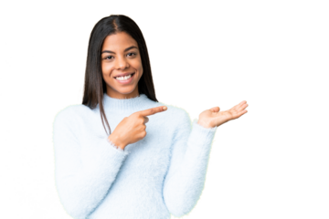 Young African American woman over isolated chroma key background holding copyspace imaginary on the palm to insert an ad