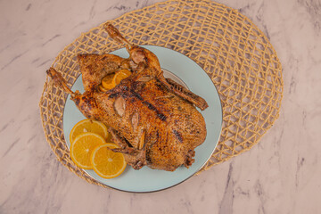 Roasted duck with orange sauce. Homemade in the oven. 
