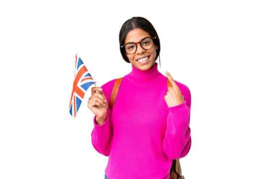 Young African American woman holding an United Kingdom flag over isolated chroma key background giving a thumbs up gesture - Powered by Adobe