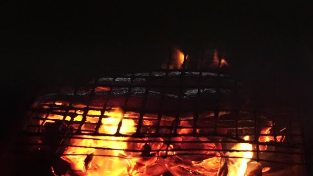 Grill fresh sea fish with embers.at payangan beach jember, east java, indonesia