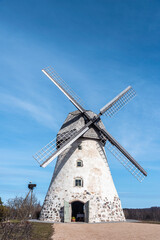 Fototapeta na wymiar The Āraiši windmill Dutch-type mill in Latvia. Built in 1852, restored in 1984. At working order.