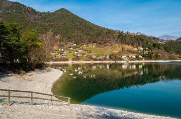 Fototapeta premium Ledro Lake in Ledro valley. Spring landscape. Trento province, Trentino Alto-Adige, Italy, Europe