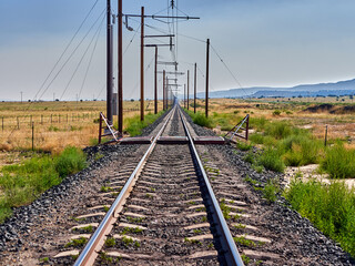 Lonely Railway. Train travel and transportation. Concept of distance and direction.