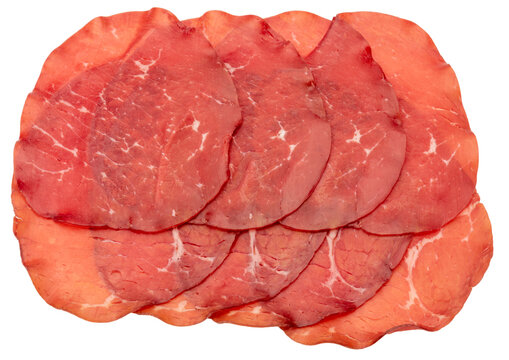 Bresaola slices, italian dried beef salami from Valtellina, cut out,  top view, 