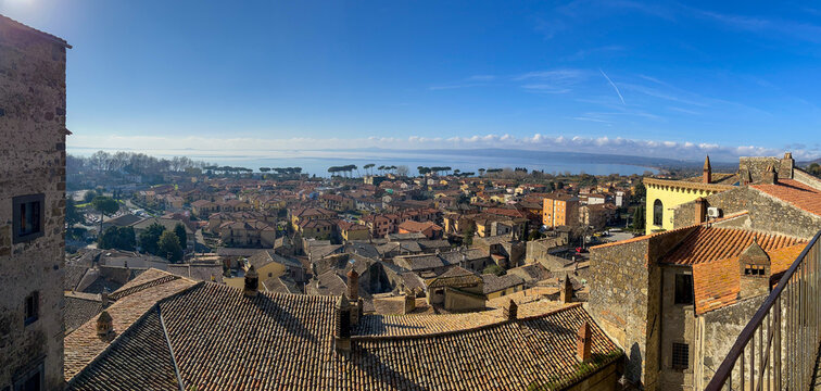 Panoramic view of Bolsena lake from the top of the old town of Bolesna. Viterbo, Lazio, Italy, Europe.