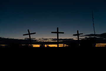 Three crosses at nightfall