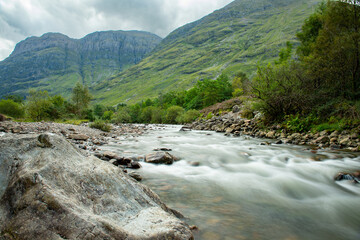 Scottish river with mountains in the background