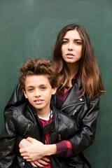 Stylish Brother And Sister In Leather Jackets