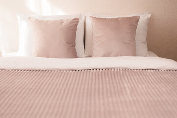 soft and comfortable pillows on a double bed close-up bedroom interior design and decor
