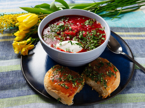 Borscht with sour-cream and buns pampushki. Ukrainian cuisine.