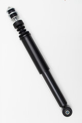 Car gas shock absorber on white background