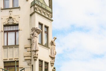 Corner of the house of classical European architecture of the old cozy tourist city. Background with selective focus