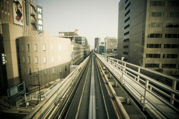 Elevated train tracks that link the city of Kobe, with its bustling harbor, Kobe, Japan.