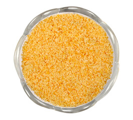 Planed peel orange in glass bowl isolated on white, top view