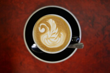 A white swan on the coffee