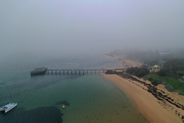 A pier footage in a foggy day
