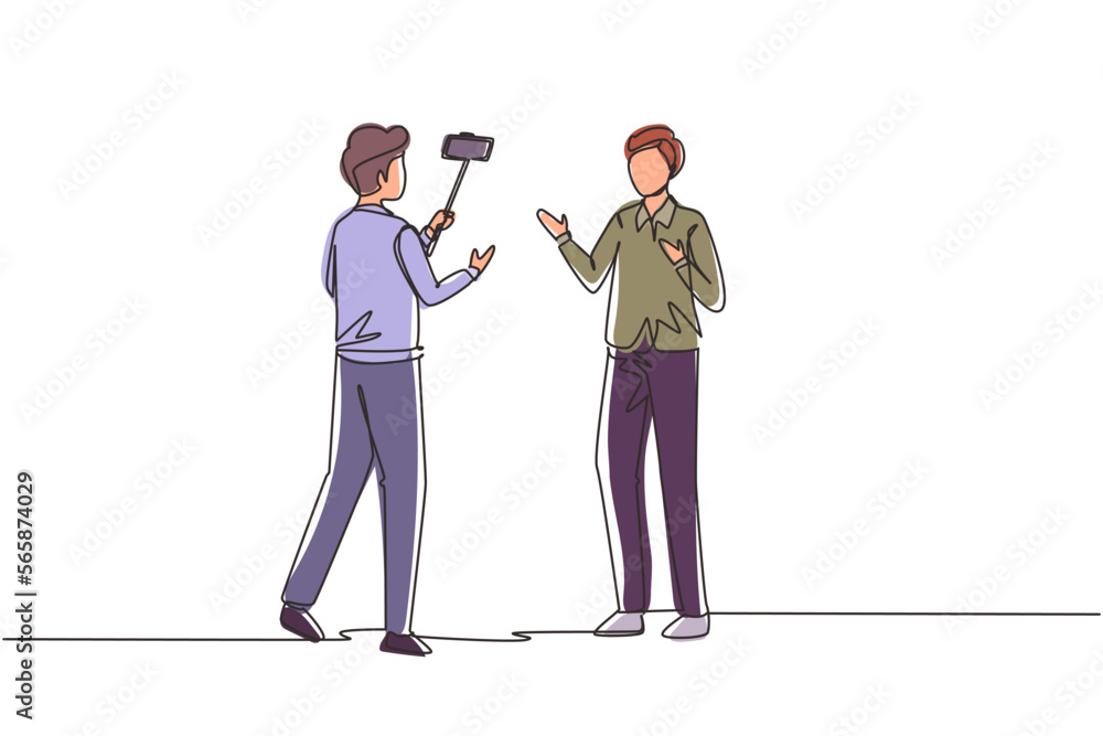 Poster single continuous line drawing presenter filming video blog with an operator on the street. man blog