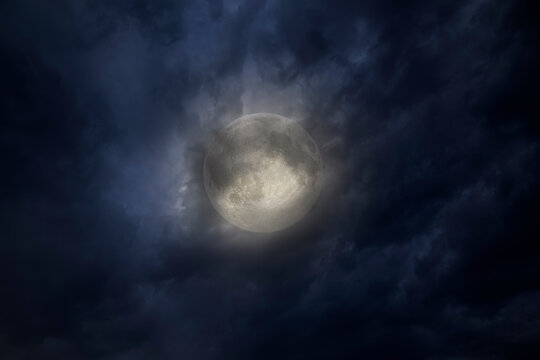 Overcast full moon night sky
