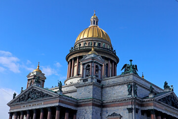 Fototapeta na wymiar Cathedral; Church; architecture; city; cityscape; Saint-Petersburg; Russia; Russian; Isaac; travel; tourism; culture; religion; dome; Petersburg; sky; landmark; colonnade; famous; Europe; building; 