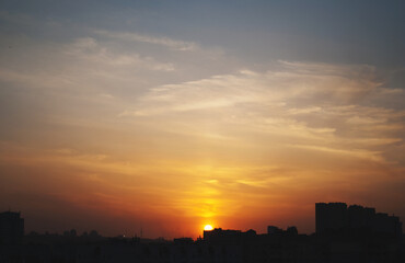 Fototapeta na wymiar View on sunset over the city