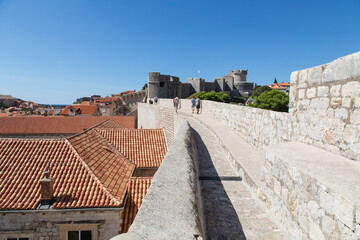 Walking along the huge and impressive wall surrounding the old town of Dubrovnik, Croatia