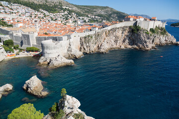 Panorama view of Dubrovnik, Croatia with its beauty of the city’s stone architecture surrounded by impressive walls and the magnificent, gentile nature of its seascape - UNESCO world heritage