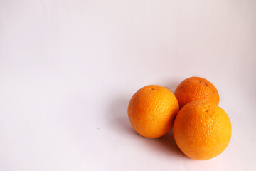 3 orange Orange or citrus sp Photographed in White Background