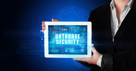 Person holding tablet, security concept