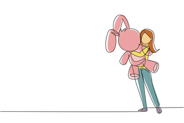 Single continuous line drawing little girl is hugging teddy bear. She is standing at full length and hiding behind toy. The shy beauty child. Dynamic one line draw graphic design vector illustration