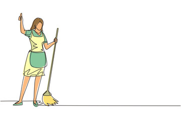 Fototapeta premium Single one line drawing smiling female cleaning company staff member holding broom and showing thumbs up gesture. Happy cleaning. Cleaning company. Continuous line draw design vector illustration
