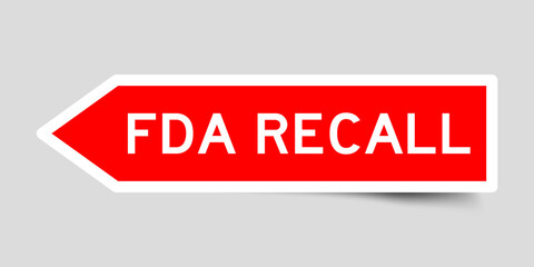 Red color arrow shape sticker label with word FDA recall on gray background