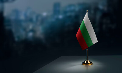 Small flags of the Bulgaria on an abstract blurry background