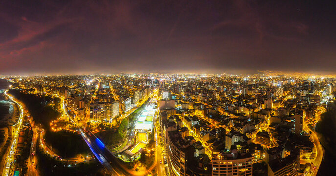 Miraflores of Lima: The capital of Peru at night with traffic and lights