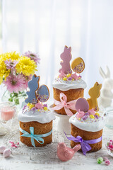 Beautiful festive table with traditional  easter bread kulich