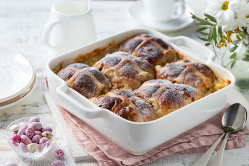 Bread and butter hot cross buns pudding - 565898481