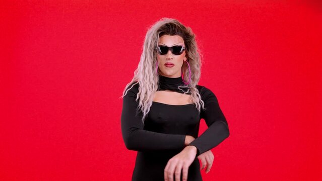Drag queen person wearing sunglasses posing with rebel attitude