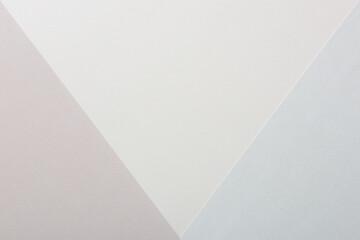 Abstract Pastel and Muted Tones Paper Texture Minimalist Background. Geometrical pale colored paper flat lay background. Minimalism, geometry and symmetry template.