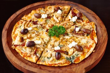 pizza on a wooden board