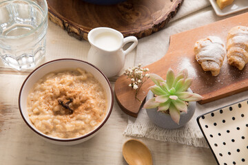 Fototapeta na wymiar Rice puding porridge arroz con leche Assorted peruvian desserts peru sweet food buffet table brunch