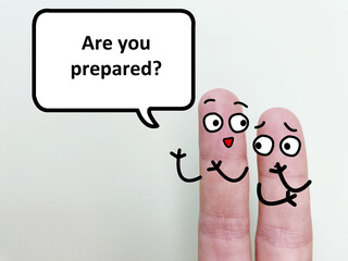 Two fingers are decorated as two person. One of them is asking another if he is prepared.