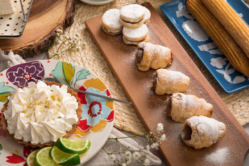 Guargueros alfajores and lemon pye Assorted peruvian desserts peru sweet food buffet table brunch
