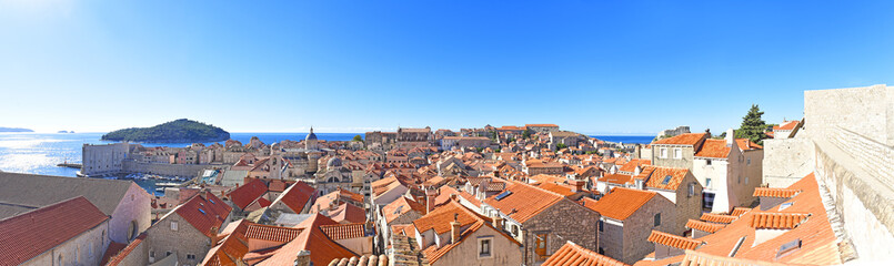 panoramic city over the old town of Dubrovnik from south harbor to island Lokrum til Fort Lovrijenac, Croatia, Adriatic Sea, Dalmatia region
