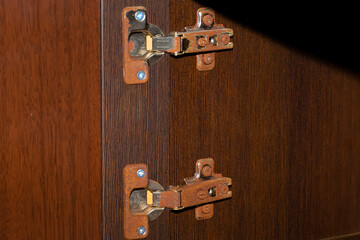rusty furniture hinge close-up