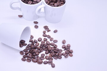 Close-up of coffee beans on white background