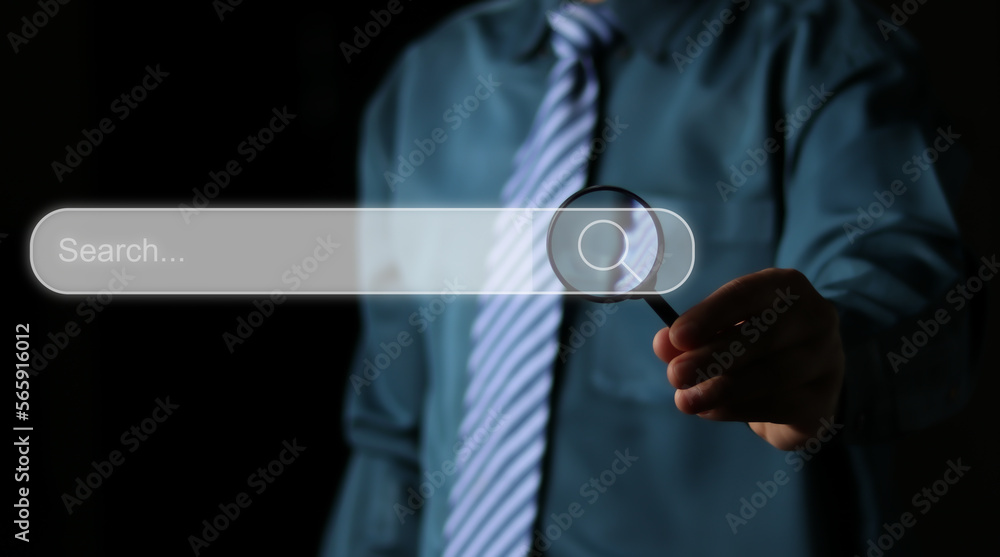 Poster data search technology search engine optimization. man hand holding magnifying glass to searching fo