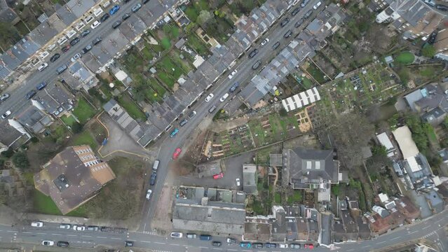 An aerial video footage from a drone passing over residential area in London.
