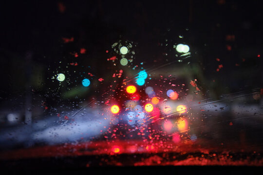 View from inside the car on a rainy night